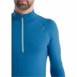 T-shirts Polos Randonnée ICEBREAKER M 150 ZONE LS HALF ZIP AZUL/HAZE 22 Bleu -Vêtements de randonnée Homme Soldes 9 106037 m 150 zone ls half zip azul haze ib104348362 04